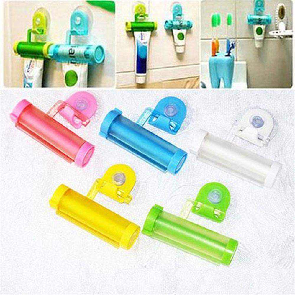 Plastic Device - A Suction Cup Press for Convenient Storage and Uniform Squeezing of Toothpaste Tubes