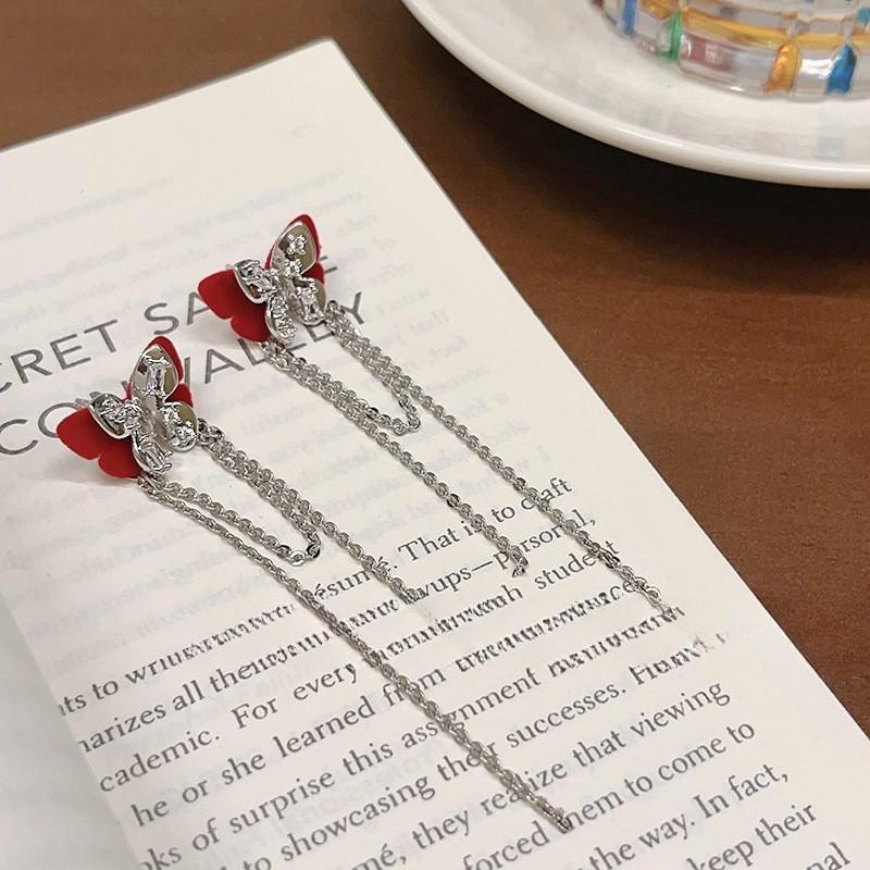 

Autumn and winter flocking butterfly fringed earrings luxury ins style niche design temperament exquisite high-end stud earrings new earrings