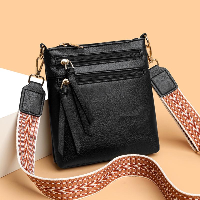 Vertikale Umhänge-Crossbody-Tasche mit mehreren Fächern und breitem Riemen