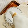 French Designer Titanium Steel Knotted Rope Ring for Women - Fashionable Simple Metal Jewelry