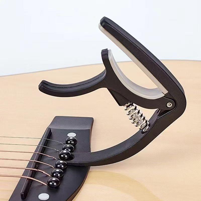 Universal Capo for Folk, Electric, Acoustic, Bass & Ukulele Guitars