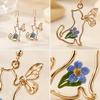 Chic Hollow Cat and Butterfly Pendant Earrings for Women - Fashionable Small Animal Ear Accessories