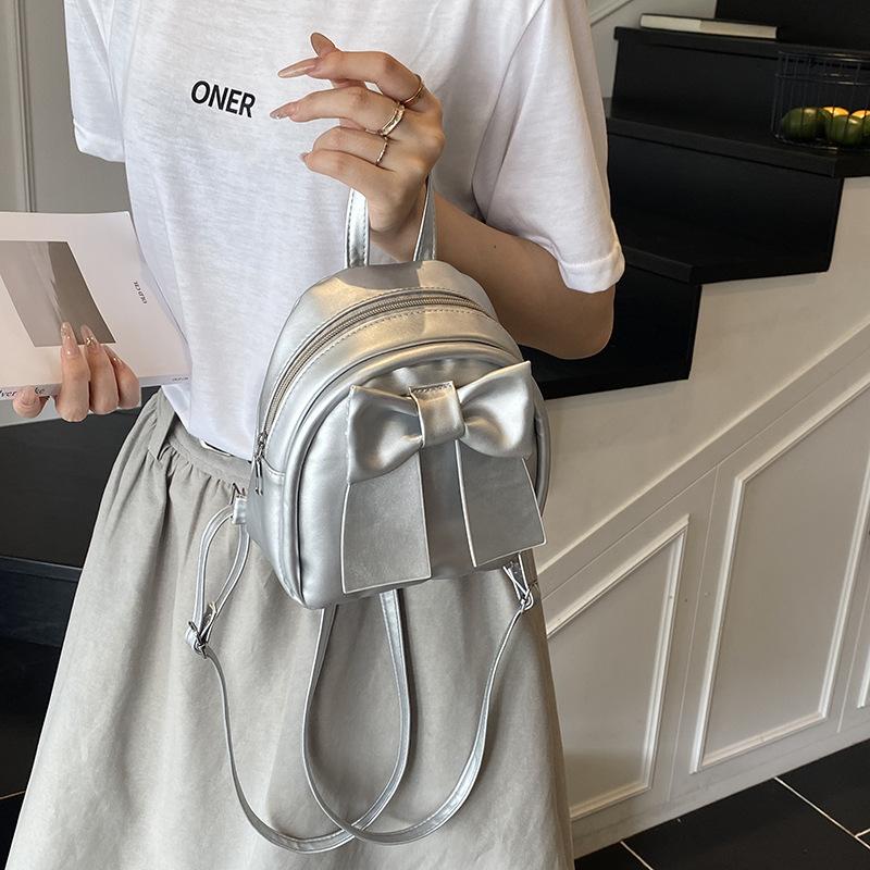 Sac à dos en cuir synthétique style coréen avec nœud papillon pour femme Sac à bandoulière matelassé léger