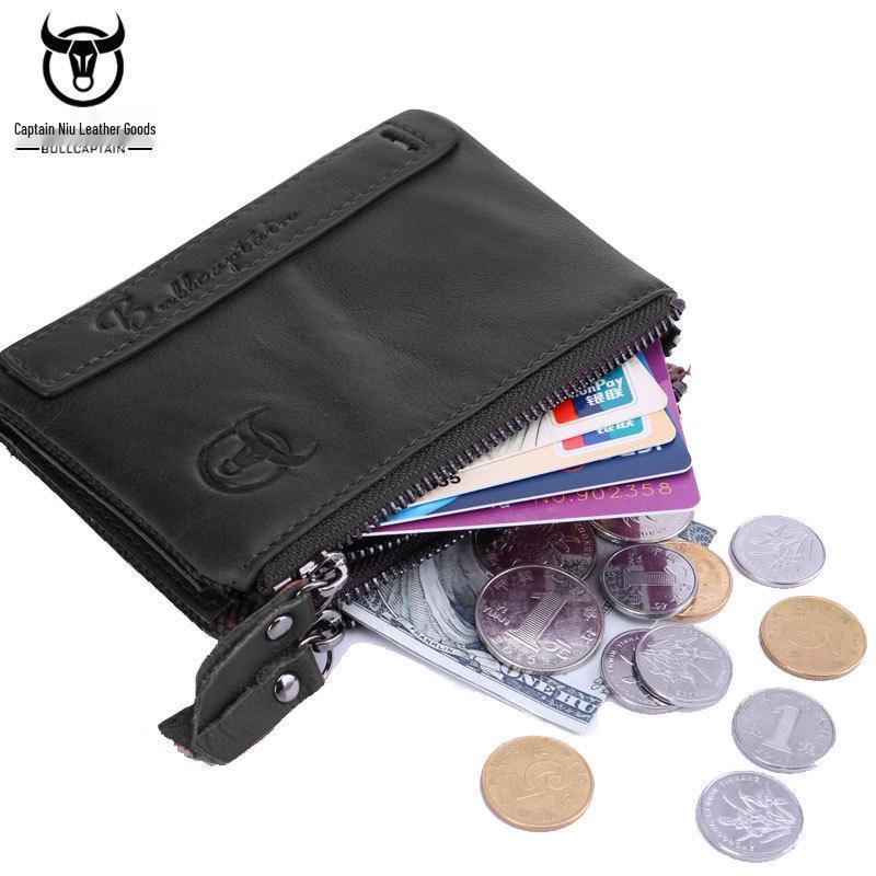 

Мужской кошелек-портмоне из натуральной кожи Cow Captain с вертикальной молнией, фотоальбомом и монетницей.