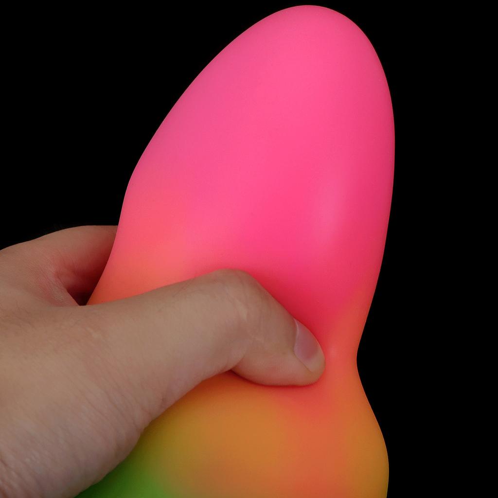 Mixed Color Glowing Dildo Simulation For Men And Women In The Backyard  Used For Masturbation As An Adult Product