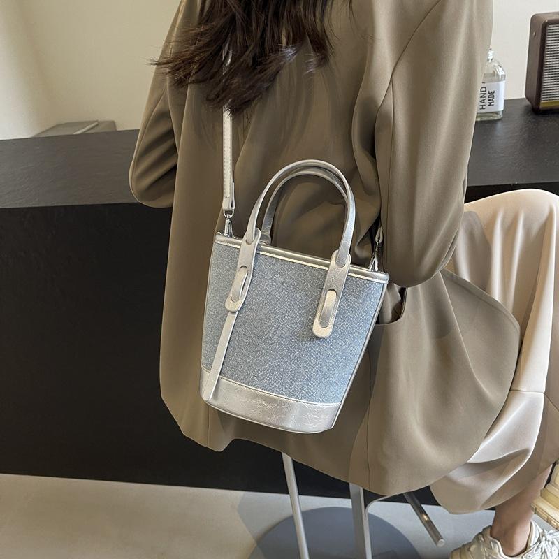 Popular contrasting color bucket bag women's new small bag fashionable portable shoulder bag textured messenger bag