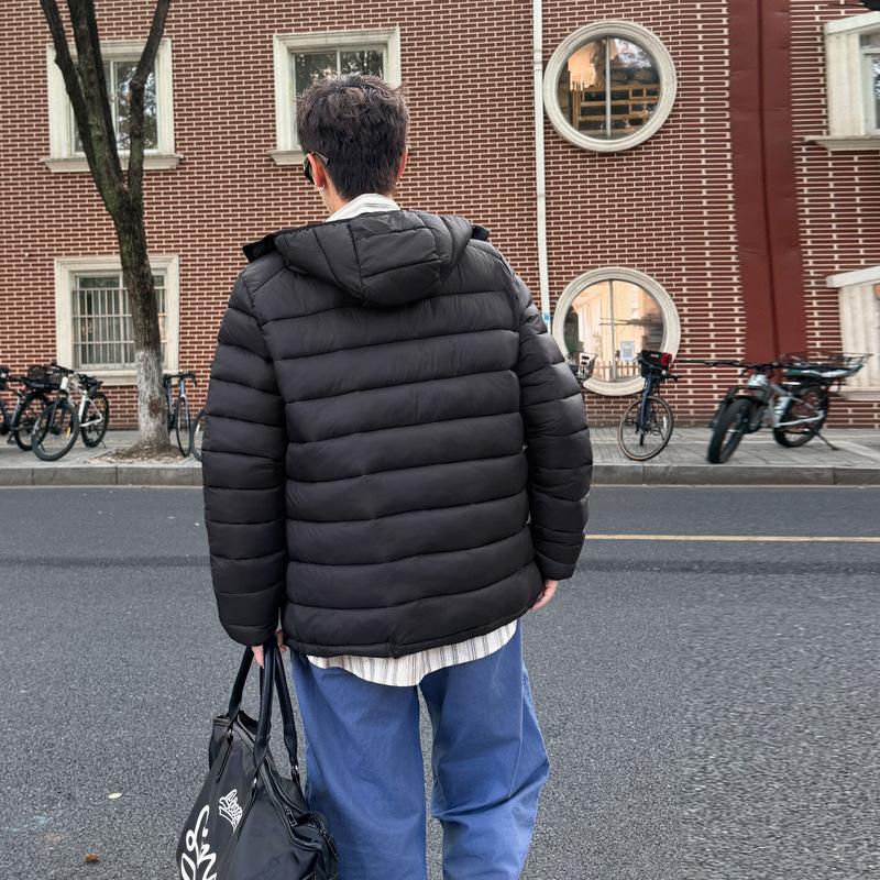 

Женская легкая стеганая пуховая куртка оверсайз с капюшоном XXL чёрный