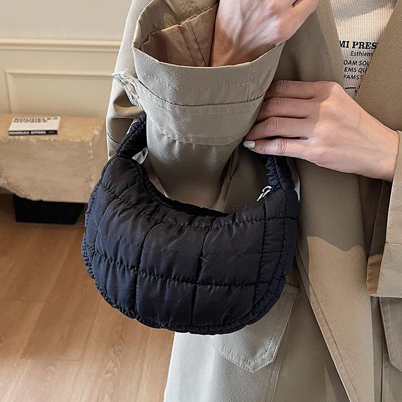 Niche fashionable pleated cloud bag women's solid color personalized hand carry cotton clothing bag