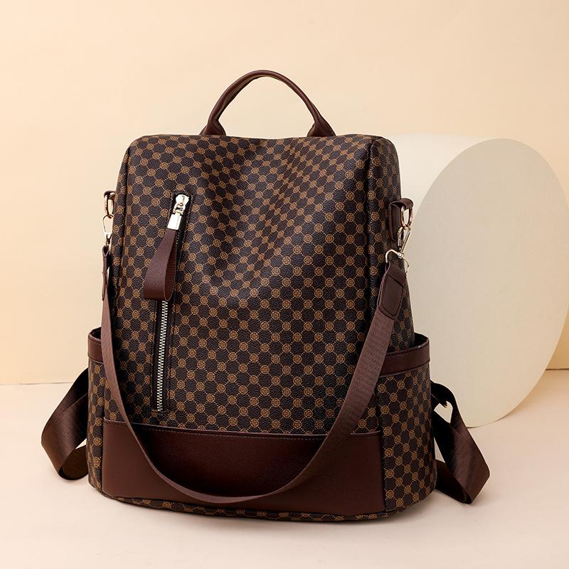 

Шкіряний рюкзак Жіночий шкільний рюкзак великої місткості темно-коричневого кольору