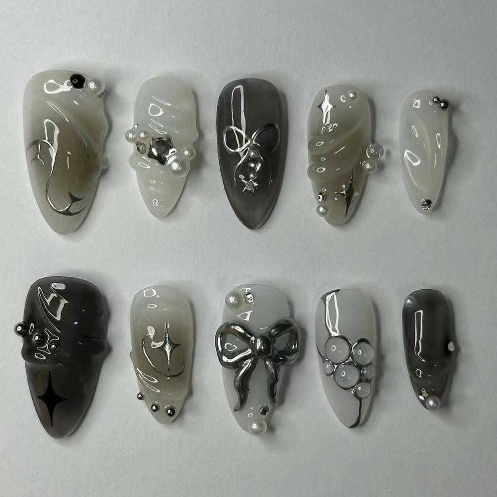

Spicy Girl Black Gradient 3D Press-On Nails with Butterfly Bow and Silver Star Glam. JP3399 [Glue Version]