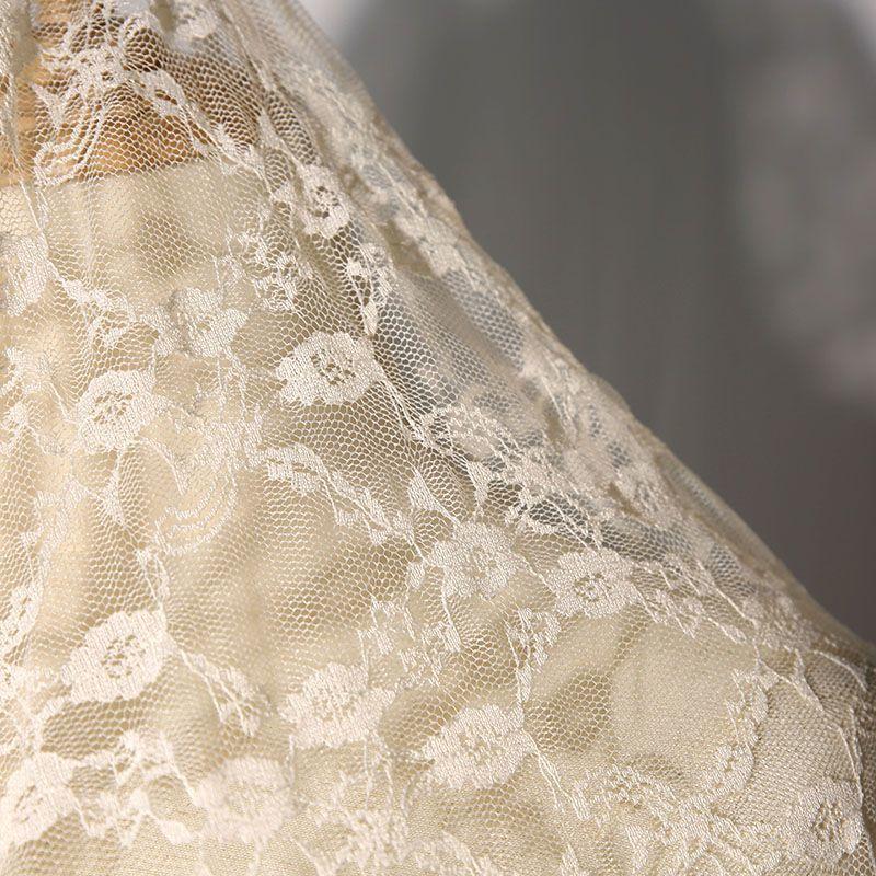 Embroidered lace fabric with hollowed-out patterns can be used for wedding dresses evening gowns and designer clothing fabrics