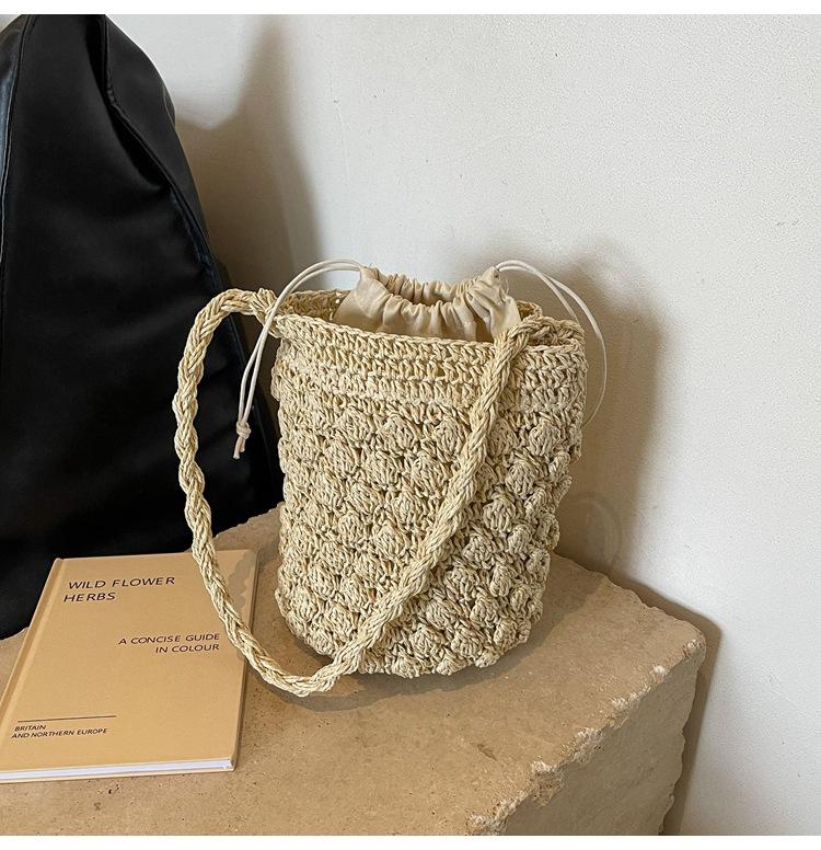 

New woven shoulder women s bag paper rope fashion woven beach portable bucket straw bag