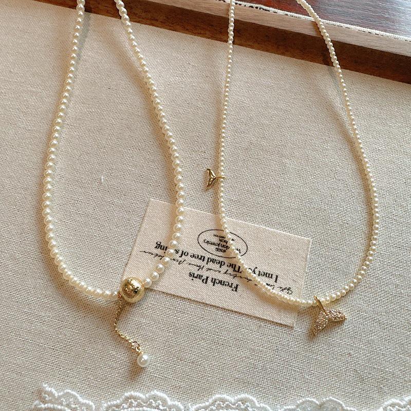 

Elegant Fishtail Pearl Necklace with Tassel Pendant for Women