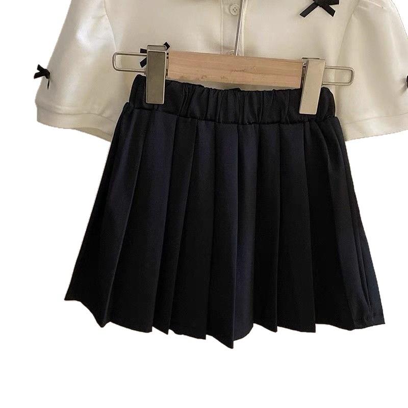 Conjunto Preppy de 2 Piezas para Bebé Niña Verano Top de Manga Corta con Lazo y Falda Plisada Atuendo de Moda para Niños Pequeños