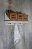Vintage style wall shelf with wooden baskets