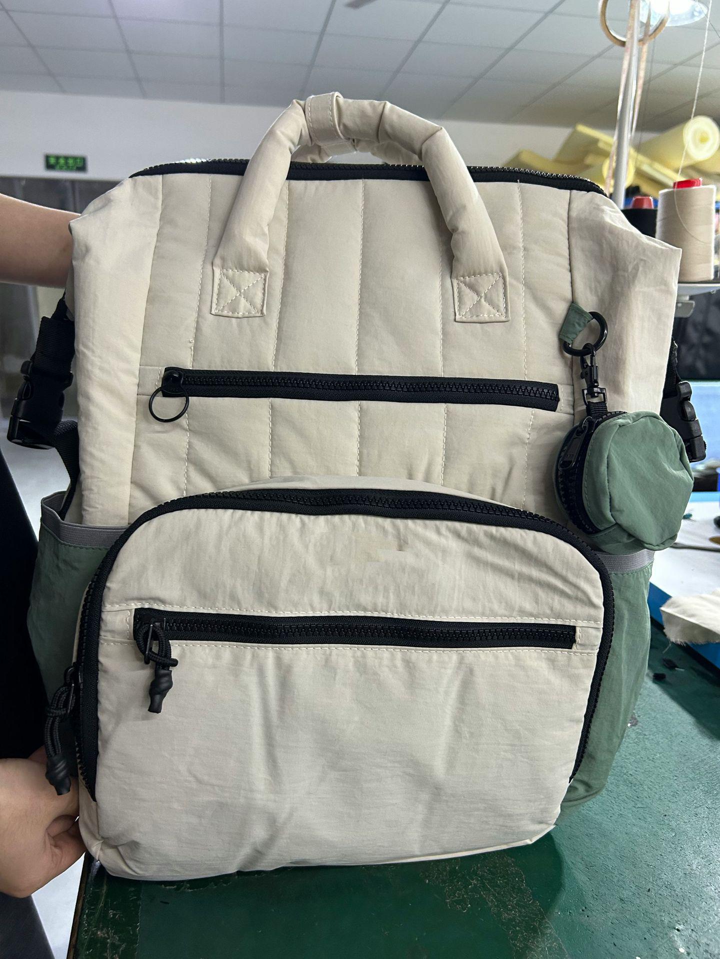 

New Striped Multifunctional Waterproof Mommy Backpack - Large Capacity, Fashionable Mother and Baby Bag for Travel. 30 x 18.5 x 43.5 cm бежевый/зелёный
