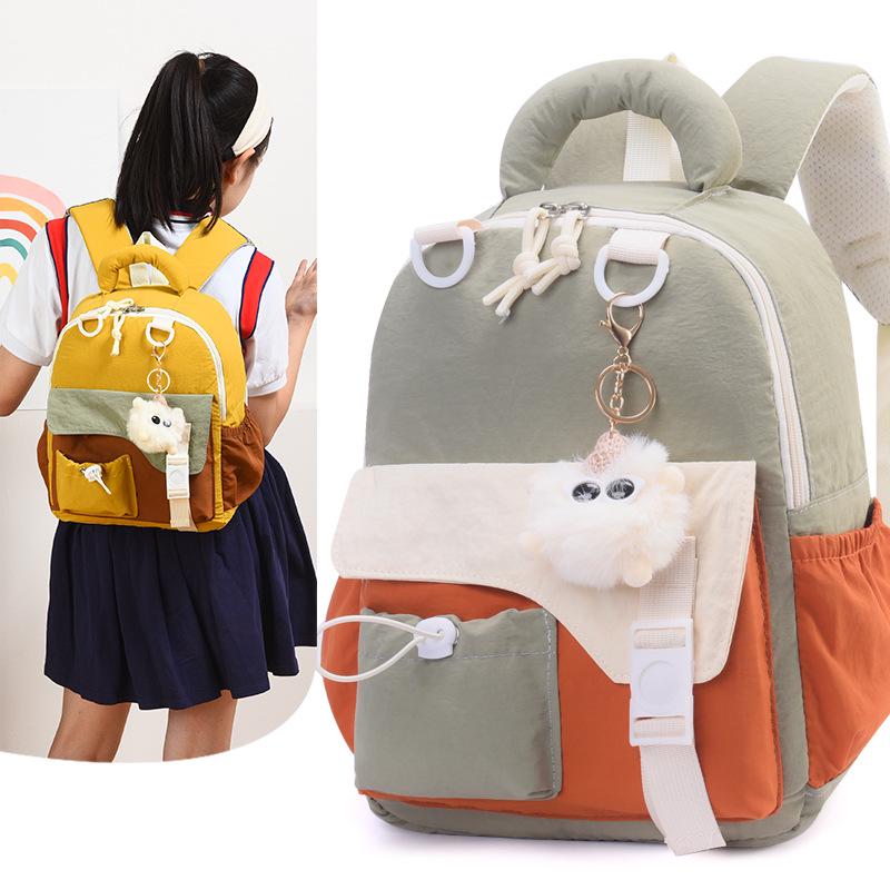 Large Capacity Cute Pendant Schoolbag - Versatile Casual Backpack for Students 2025 Autumn/Winter Collection