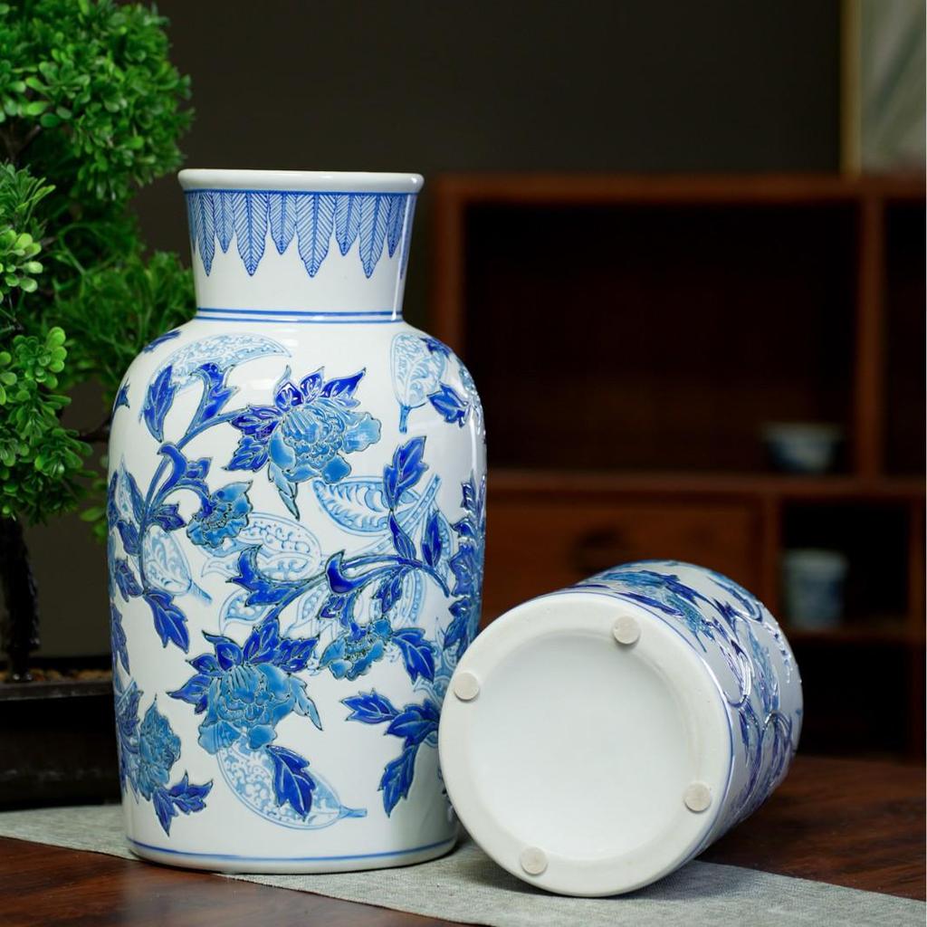 Blue & White Hand-Painted Porcelain Vase: Elegant Ceramic Ornament for Living Room or Entryway.
