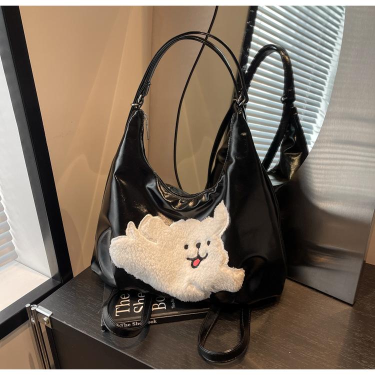 

Backpack women s large capacity 2024 new casual niche design multi-functional double shoulder messenger bag dumpling bag чорний