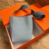 2023 New star with the same wide shoulder strap sangle bucket bag single shoulder oblique span leather women's bag simple child and mother bag