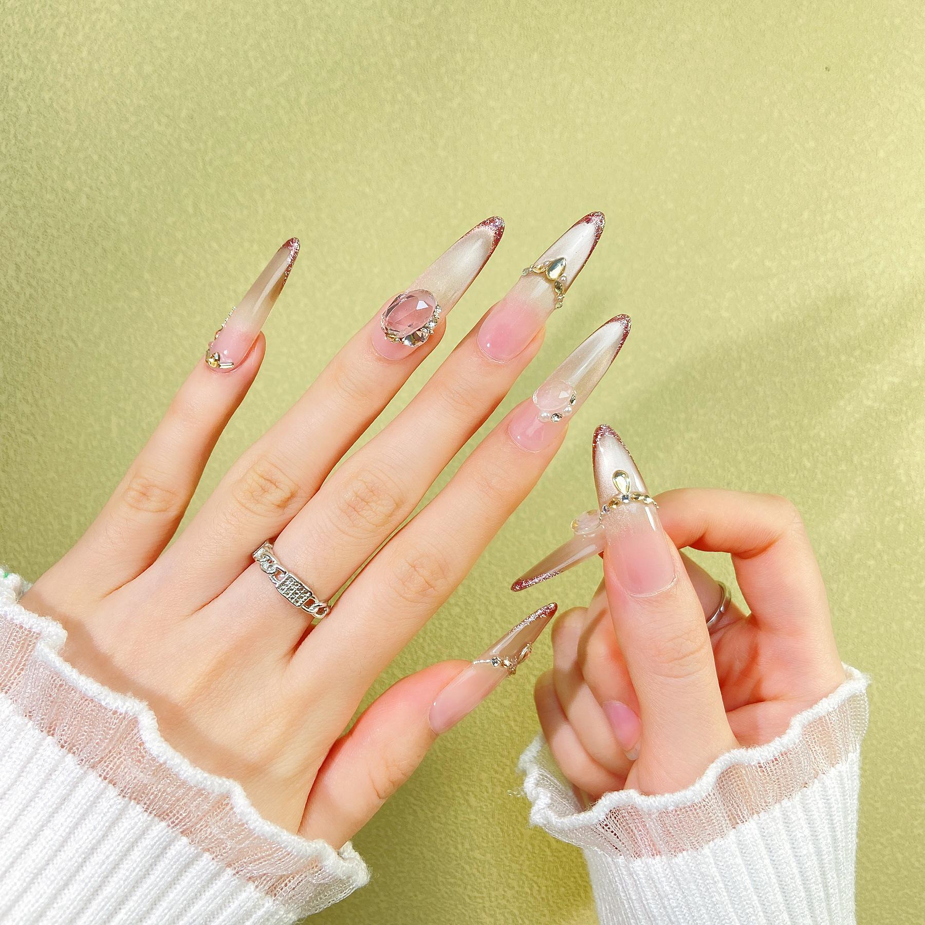 

Cat Eye Wearable Nails: Handmade Gradient Pink with Large Diamonds - Light Luxury Style for a Radiant Manicure.