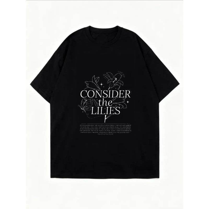 Vintage Black Oversized T-Shirt with Lily & Butterfly Print – "Consider the Lilies" Artistic Faith-Inspired Top