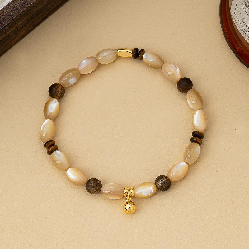 New Chinese coffee crystal cat eye shell agarwood beaded bracelet fashionable versatile high-end rice bracelet stacked wear