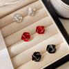 Luxury-simplified Elegant and Exclusive Small-scale Camellia Flower Stud Earrings for Women, in A Cold and Minimalist Style.