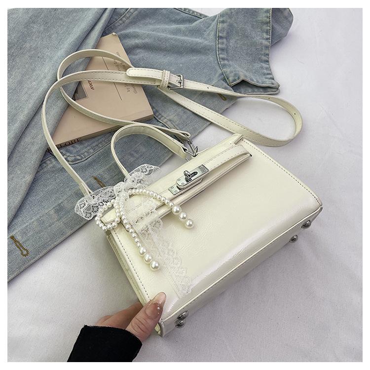 

Premium texture small bag, women s bag, Kelly bag, women s trend niche style shoulder messenger bag No pendant