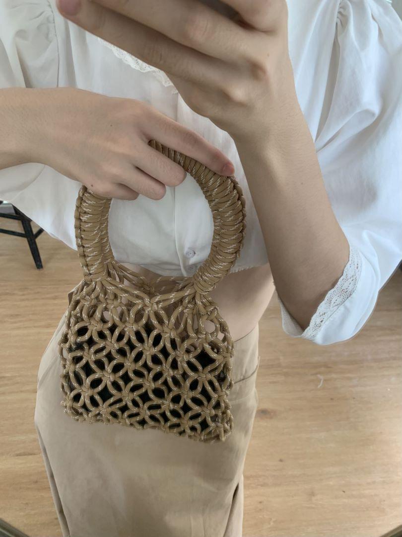 

2025 ніша порожнистий дизайн ткана жіноча сумка нейлонова мотузка ручної роботи допамін кольорова схема ткана сумка хакі