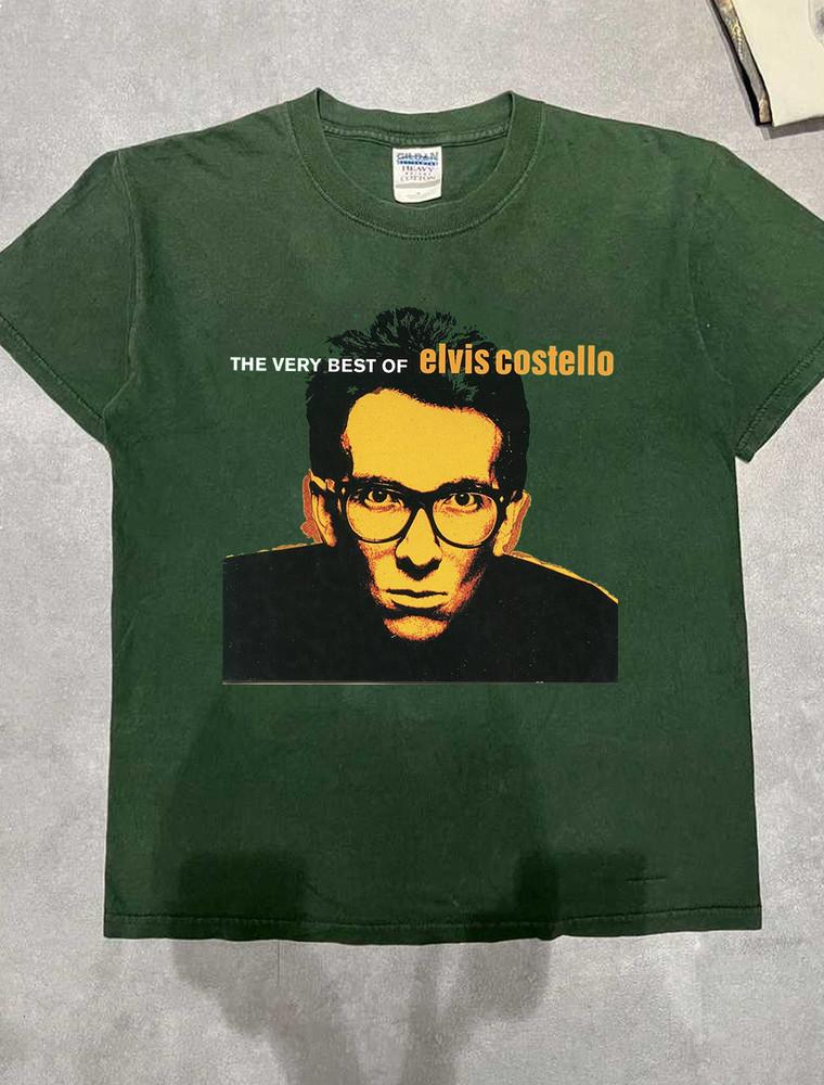 

The Very Best of Elvis Costello Green T Shirt Size S-5XL SS1166 Unisex T-Shirt L