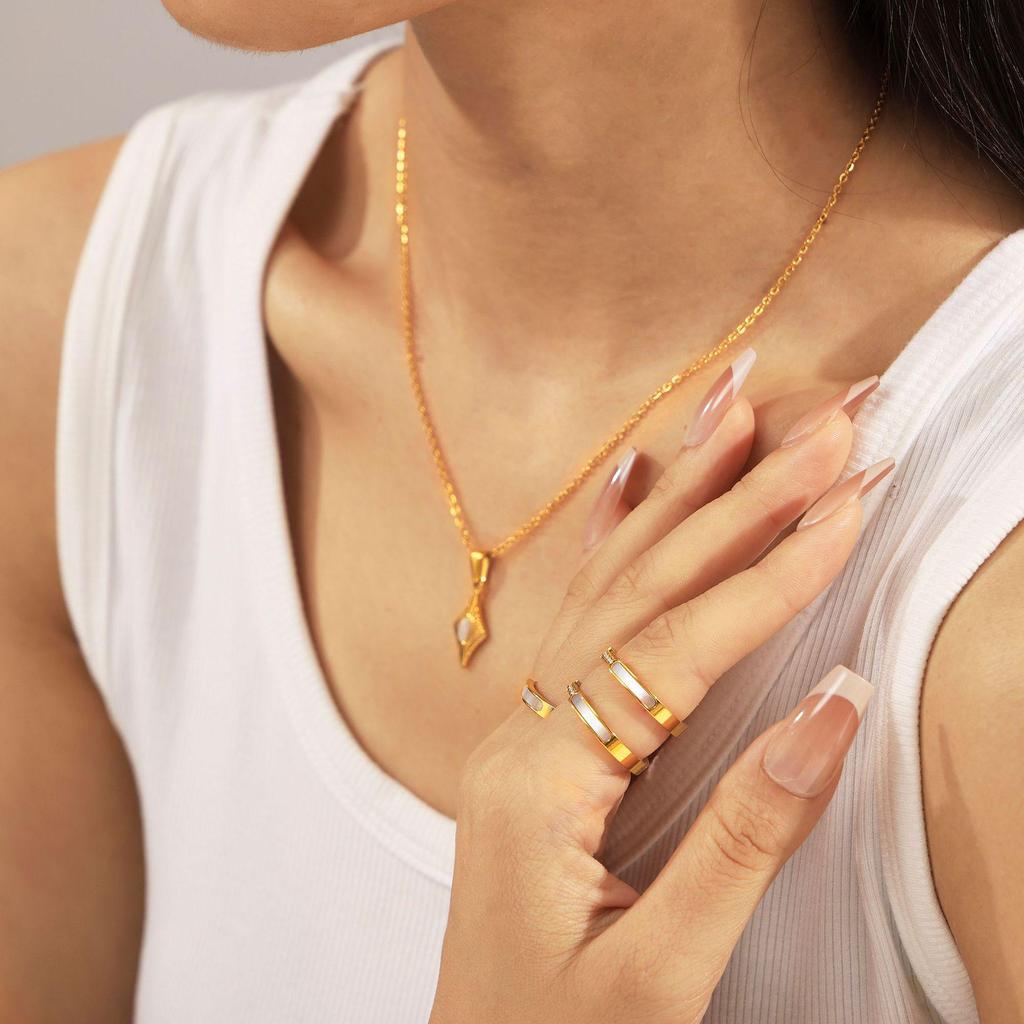 European & American Style Four-Pointed Star Cat's Eye Stone Pendant Necklace Set with Titanium Steel Clavicle Chain and Seashell Ring