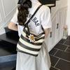 Design sense bag women's summer contrasting color striped woven bag large capacity leisure vacation bucket bag