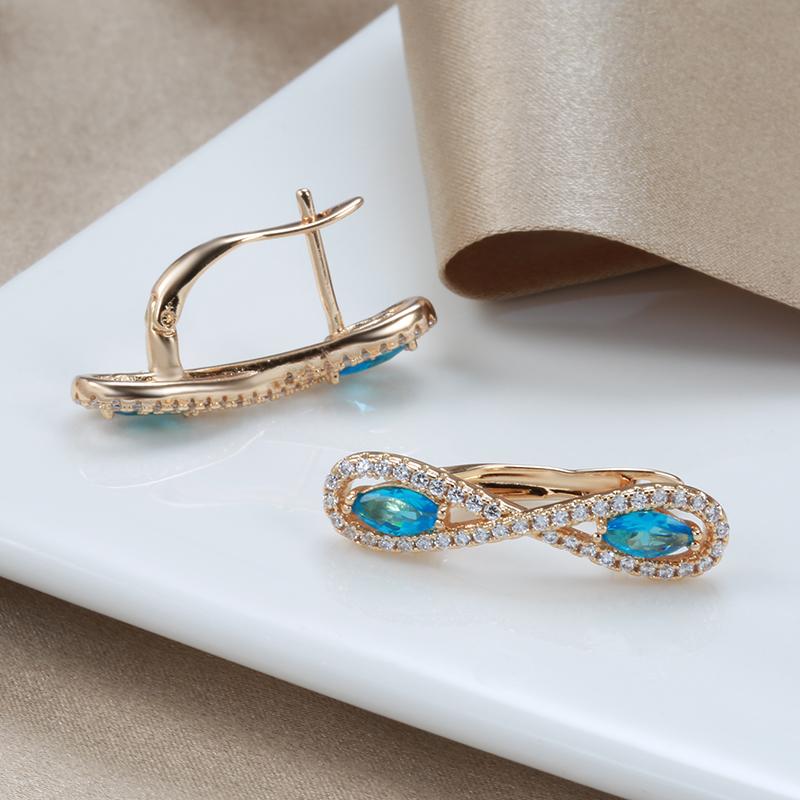 Kinel Blue Zircon Symmetric Rose Gold Color Earrings