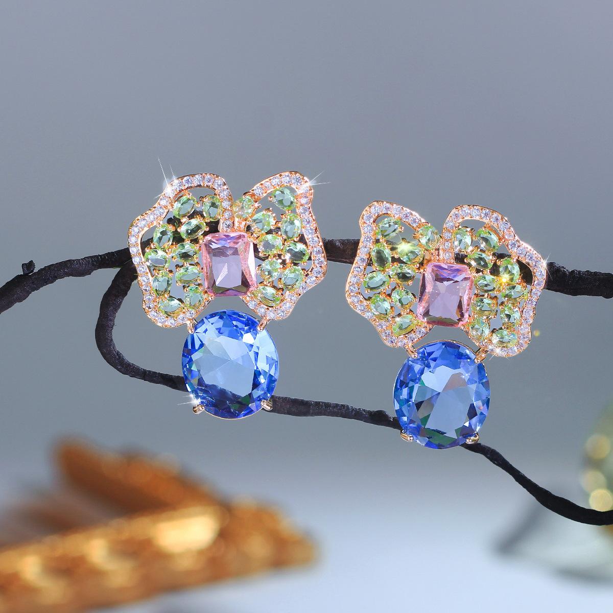 

Silver Needle Light Luxury Bow Zircon Stud Earrings Fashion Geometric Irregular Color Zirconium Petals Light Luxury Temperament Earrings