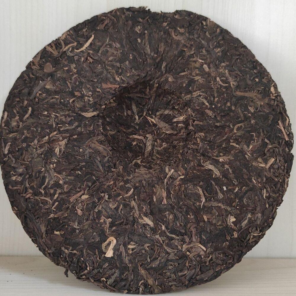 Xia Guan 8113 Jarní koláč XY Speciální Čaj Pu-erh Čaj Pu-erh Surový 357g