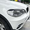 Auto-Scheinwerfer-Augenbraue Augenlid-Aufkleber für BMW X5 E70 30d 48i 30i 35d 40d 30d 50i 35i M50d 2006-2013 Zierleuchte Abdeckung Karosserie-Kits