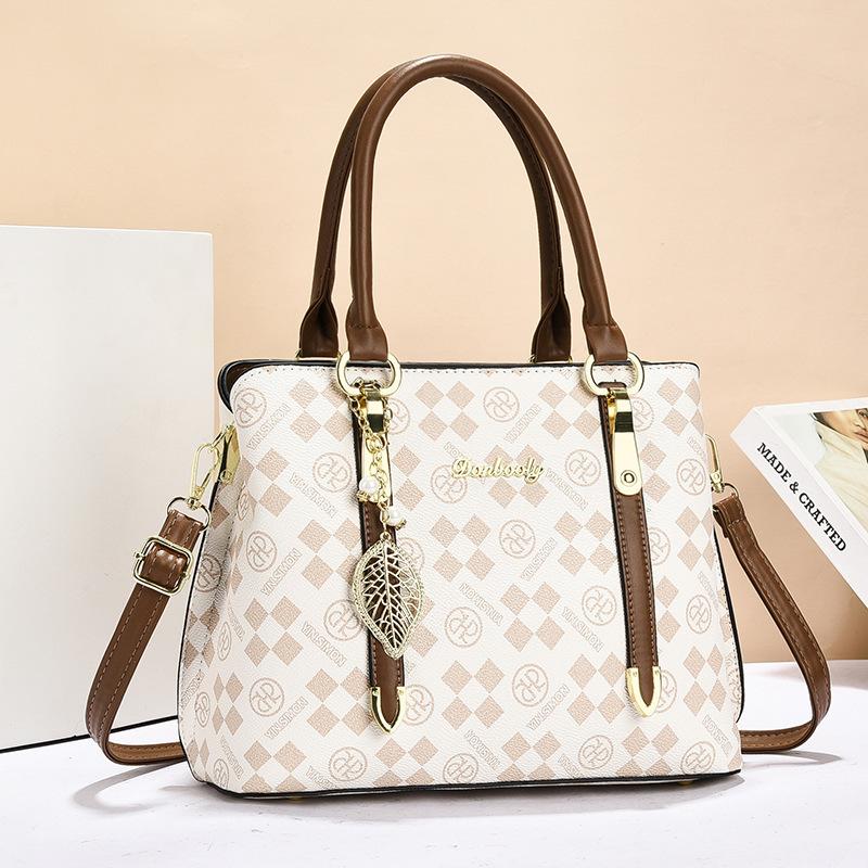 

Bags Large-capacity women s commuter mother bags New versatile shoulder handbags Women s bags Tide