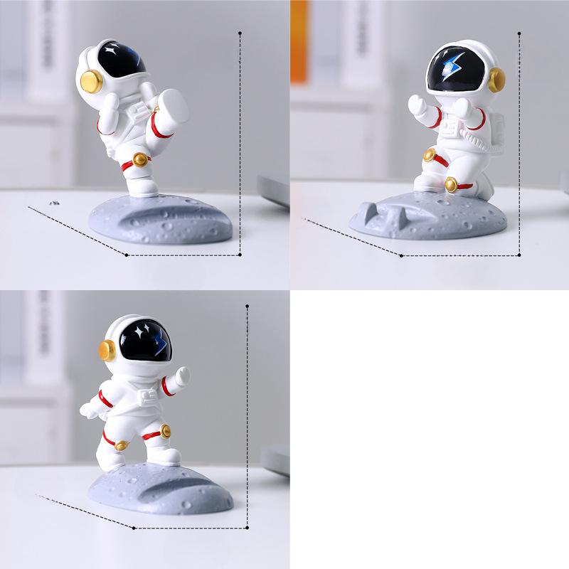 

Астронавт Мобильный телефон Поддержка Украшения Фигурка астронавта Ленивый планшет Поддержка Милый настольный декор Подарок