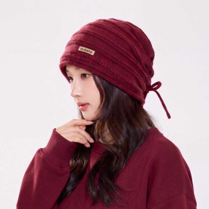 Winter new versatile solid color cloth label strap stacking hat women's thickened warm knitted hat source