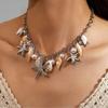 Collana corta da donna in stile bohémien con conchiglia, stella marina, perla e nappa, adatta per le vacanze