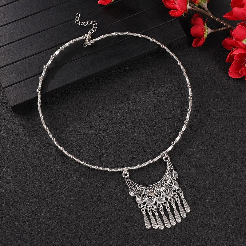 Vintage tassel collar hollow flower seedling silver pendant necklace niche personality collarbone chain women