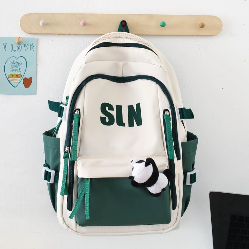 Large capacity ins wind backpack female junior high school high school student lightweight schoolbag computer backpack male trendy model