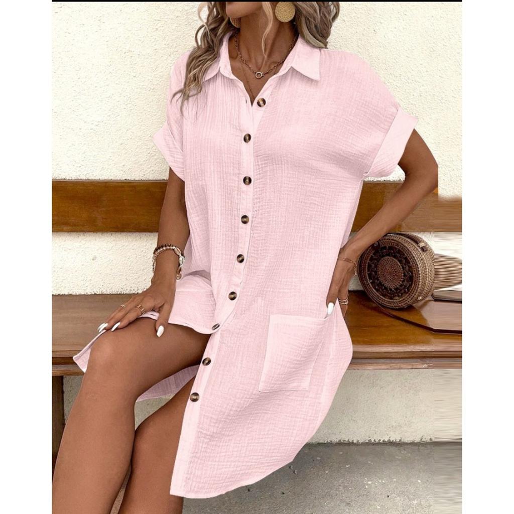 A Simple White Shirt Skirt, Made of Breathable Cotton, with A Streamlined Collar Design and Orderly Button Arrangement, Adding A Vintage Charm