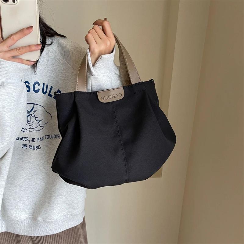 Women's casual monochromatic shoulder bag large capacity interior compartment zipper bags high quality