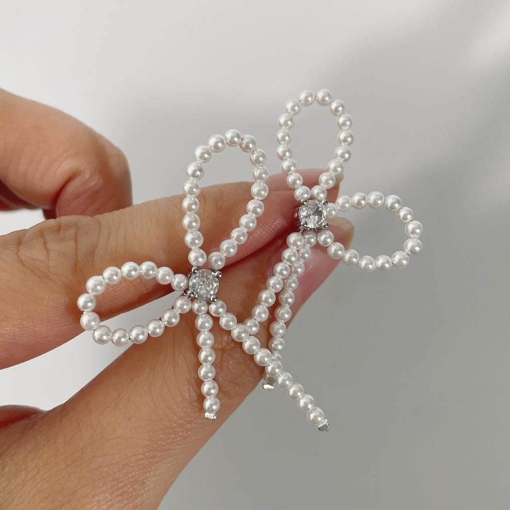 Simple and stylish S925 Temperament bow imitation pearl stud earrings women's zirconium necklace jewelry