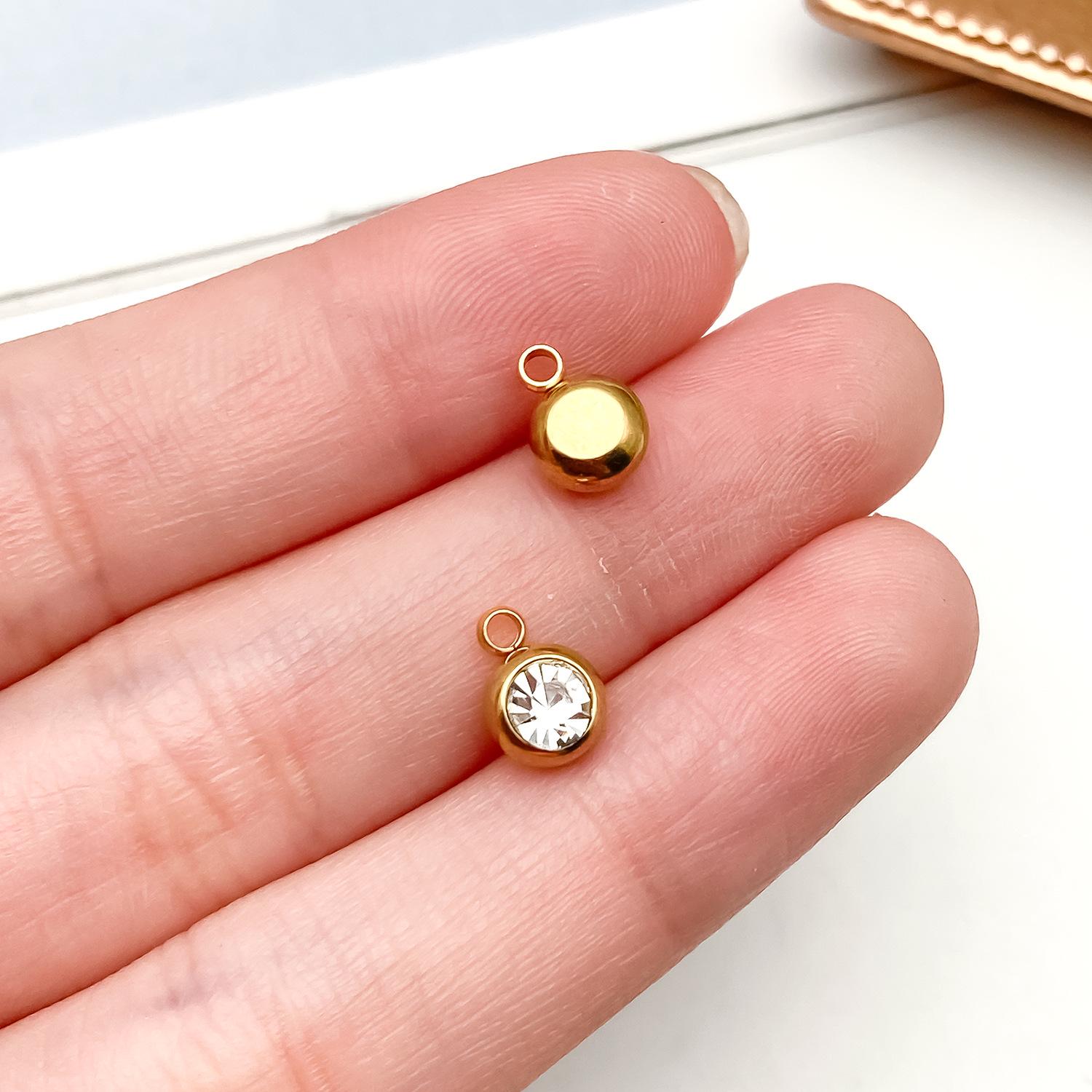 

Gold Stainless Steel Zodiac Birthstone Jewelry: Necklace, Bracelet, Pendant with Colored Diamond Accents