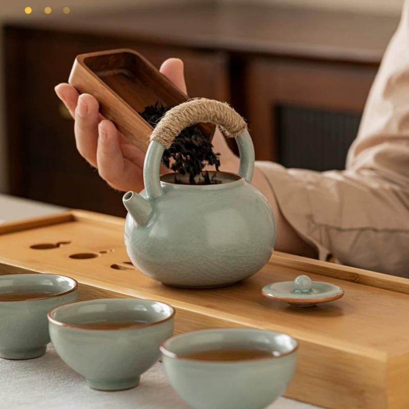 Ru kiln Kung Fu tea set with gift box, household complete set of ceramic tea set gifts, practical and anti-scalding for travel