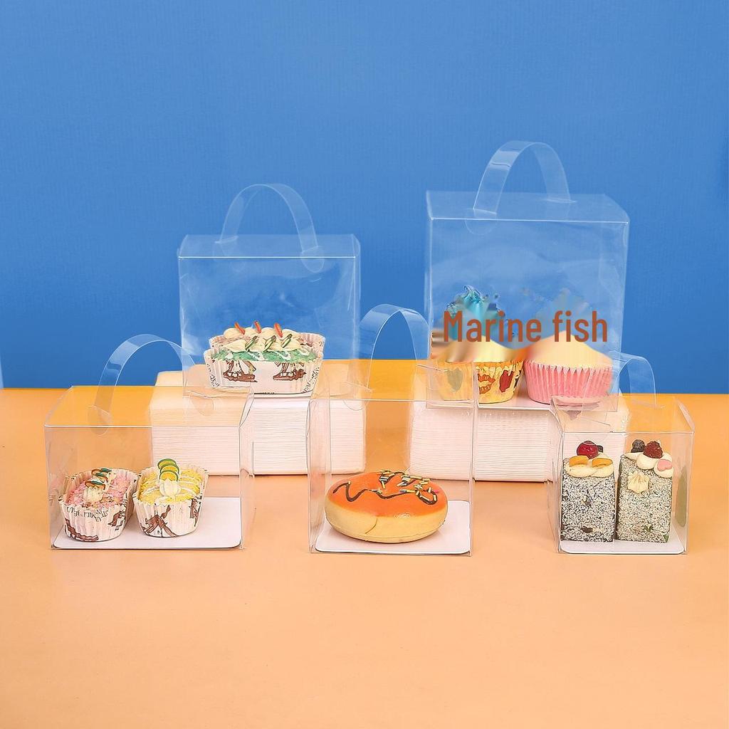 Transparentes weißes Kartontablett mit PET-Kunststoff für Kuchen, Kekse, Süßigkeiten, Backwaren und knusprige Schokoladen-Schneeflocken.