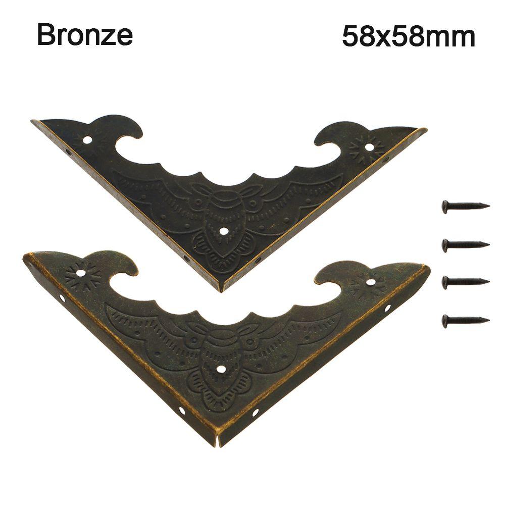 

Мебельная фурнитура Антикварная ювелирная отделка Уголок Защита углов Ножки Уголок Детали для деревянной коробки 58x58mm бронзовый